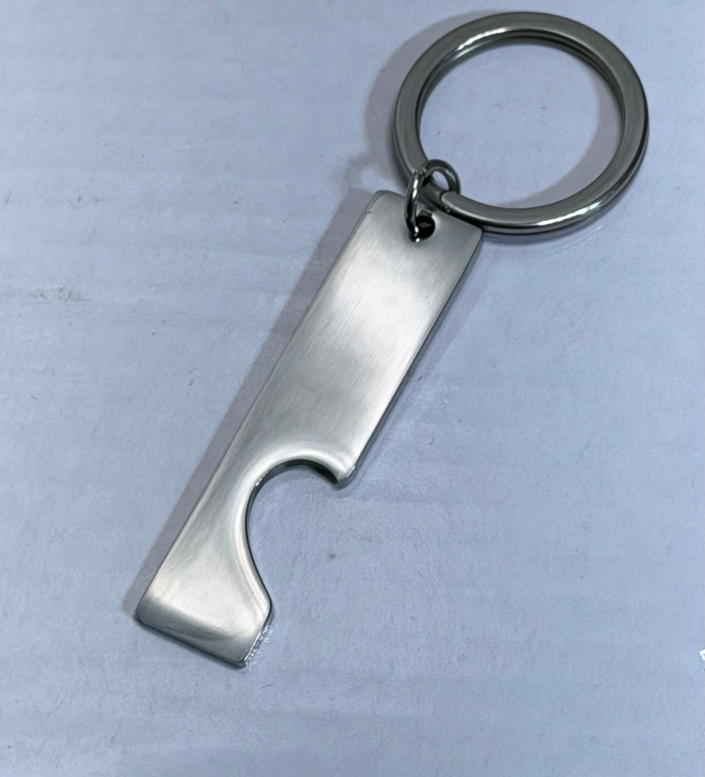 Bottle opener key chain, pry tool, stainless steel.