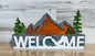 Mountains and Trees Welcome Sign